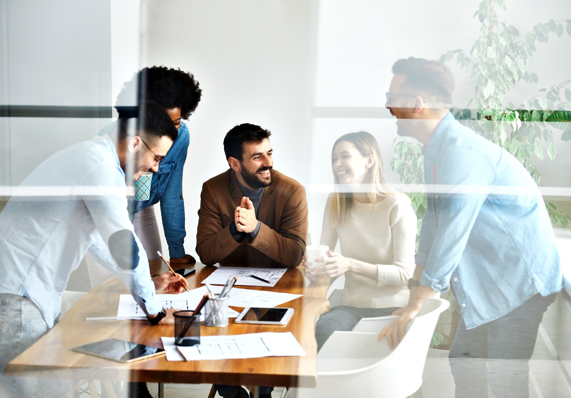 young business people meeting office teamwork happy  success corporate discussion casual startup desk